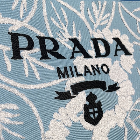 This Prada embroidered drill tote features an enlarged Prada logo on the front. - Picture 7 of 11